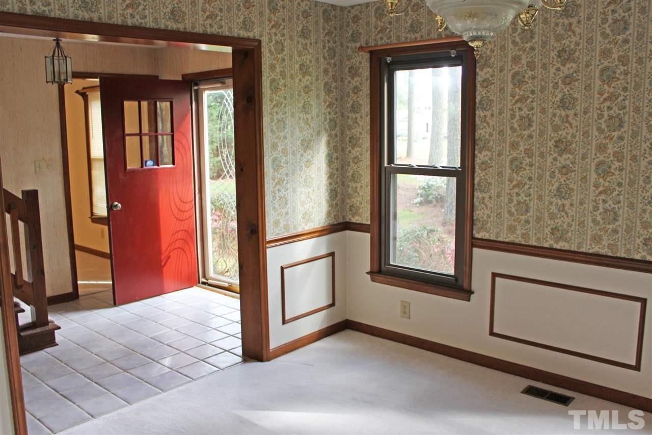 3300 Manor Ridge Drive Raleigh, NC 27603 - Photo 3 of 25 Step inside to an inviting tiled foyer.