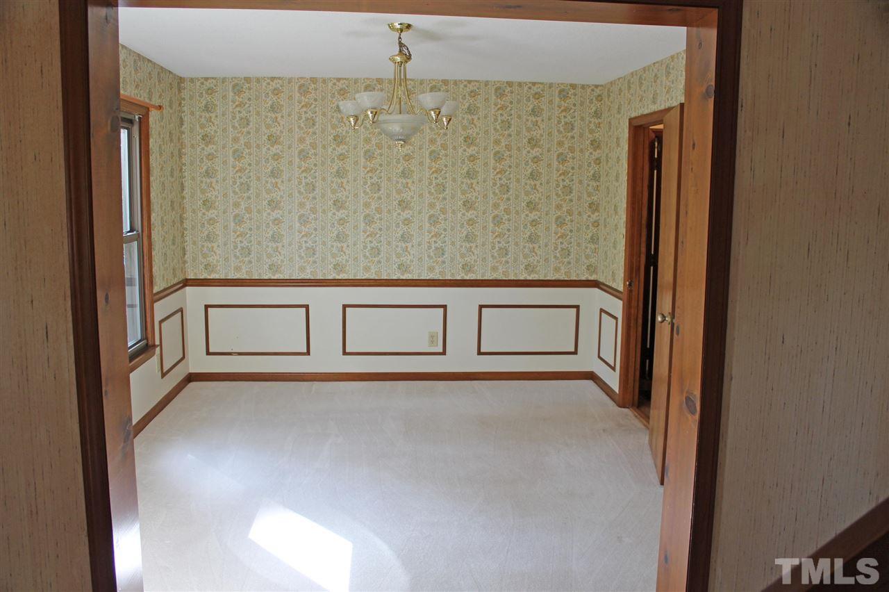 3300 Manor Ridge Drive Raleigh, NC 27603 - Photo 4 of 25 Versatile area for formal dining or home office.