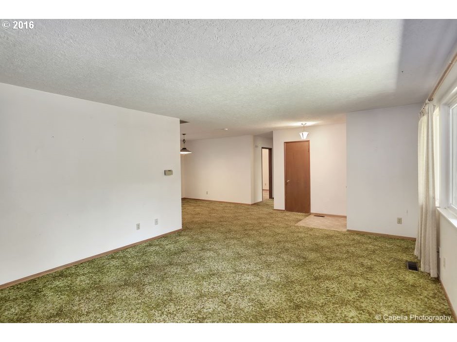 19428 Northwest Logie Trail Road Portland, OR 97231 - Photo 5 of 20 a view of an empty room