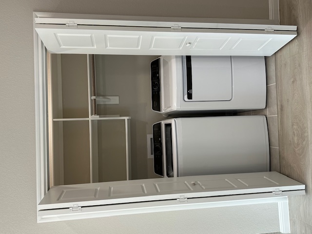 332 Bendecido Loop Elgin, TX 78621 - Photo 13 of 39 a utility room with washer and dryer