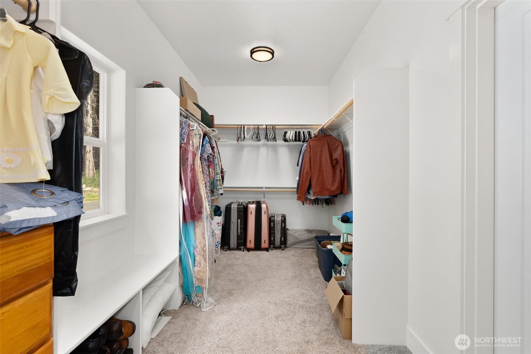 809 Southwest Gertrude Avenue Winlock, WA 98596 - Photo 20 of 40 a view of walk in closet with clothes and shoes