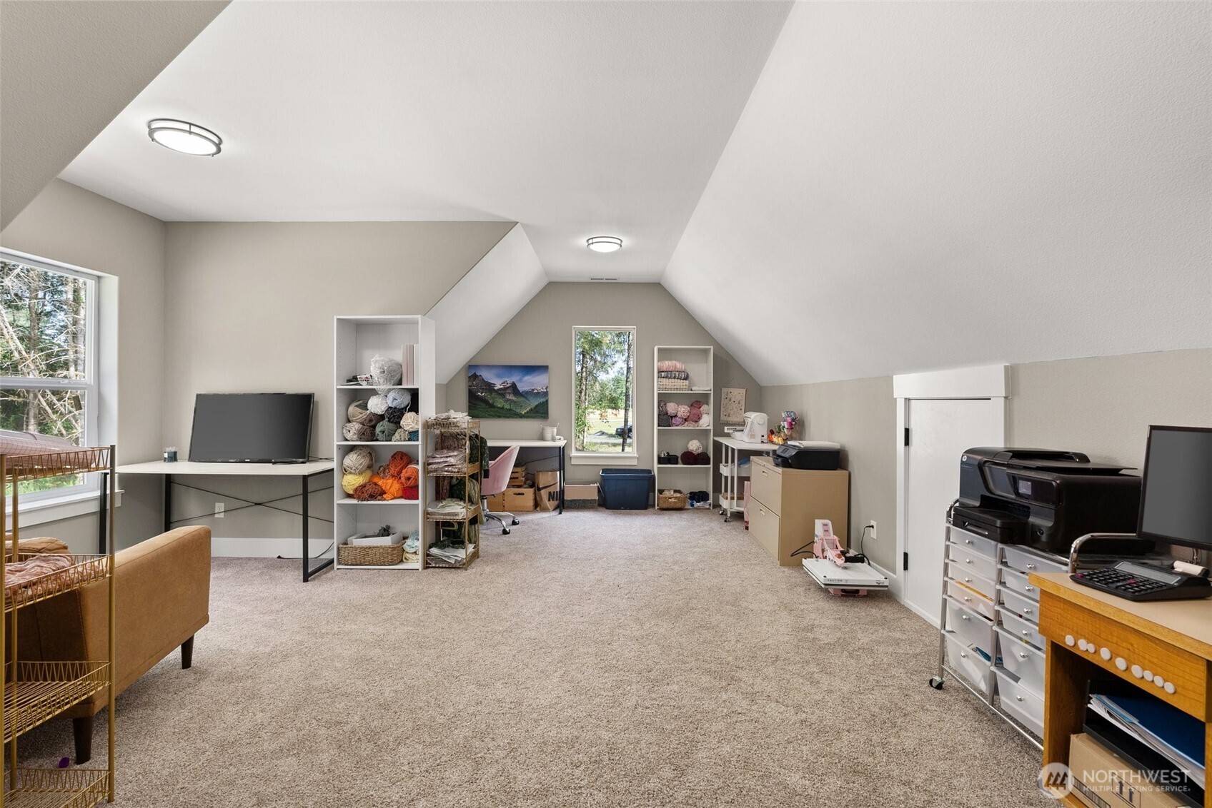 809 Southwest Gertrude Avenue Winlock, WA 98596 - Photo 27 of 40 a view of a livingroom with furniture and a flat screen tv