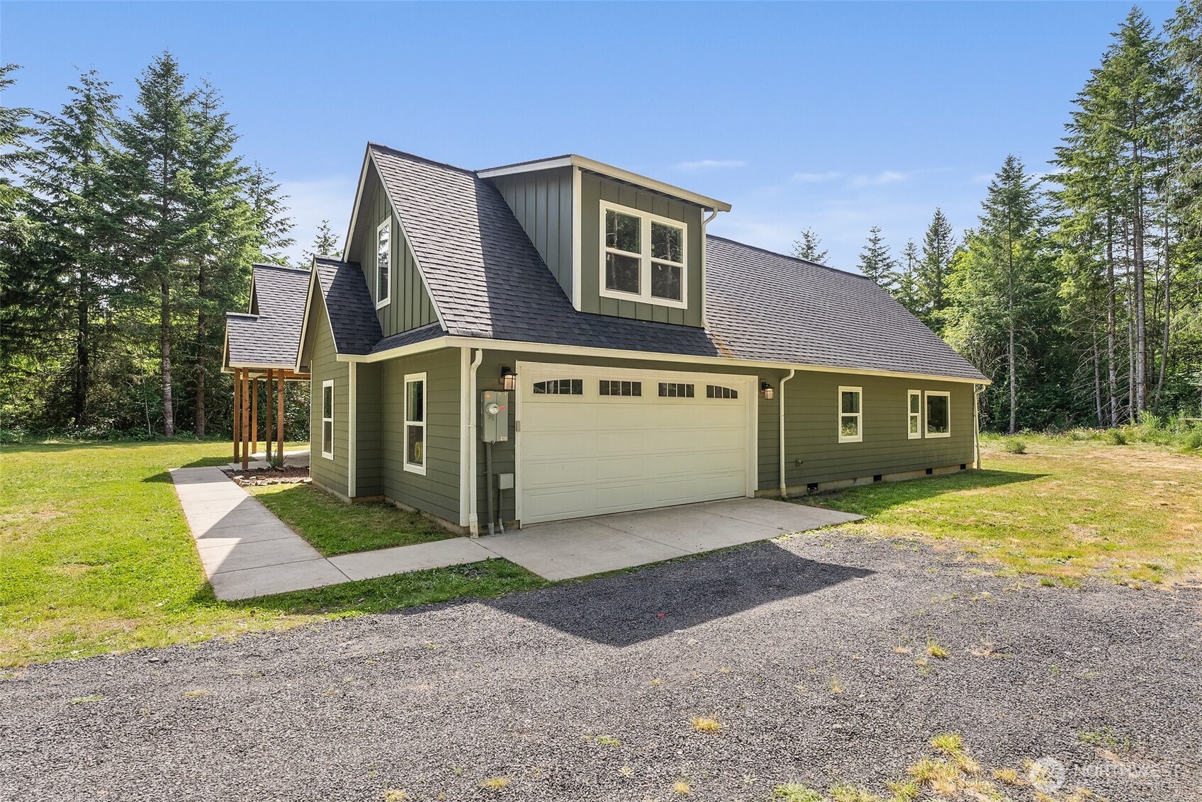 809 Southwest Gertrude Avenue Winlock, WA 98596 - Photo 37 of 40 a front view of a house with a yard