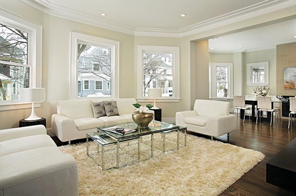 69 Coolidge Street Brookline, MA 02446 - Photo 2 of 9 a living room with furniture and a large window