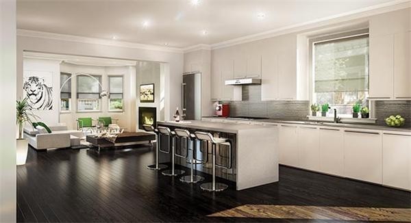 69 Coolidge Street Brookline, MA 02446 - Photo 4 of 9 a living room with kitchen island granite countertop wooden floor and a large window
