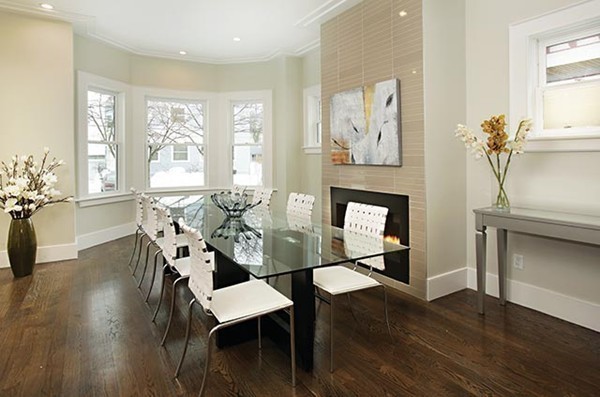 69 Coolidge Street Brookline, MA 02446 - Photo 6 of 9 a living room with furniture a dining table and wooden floor