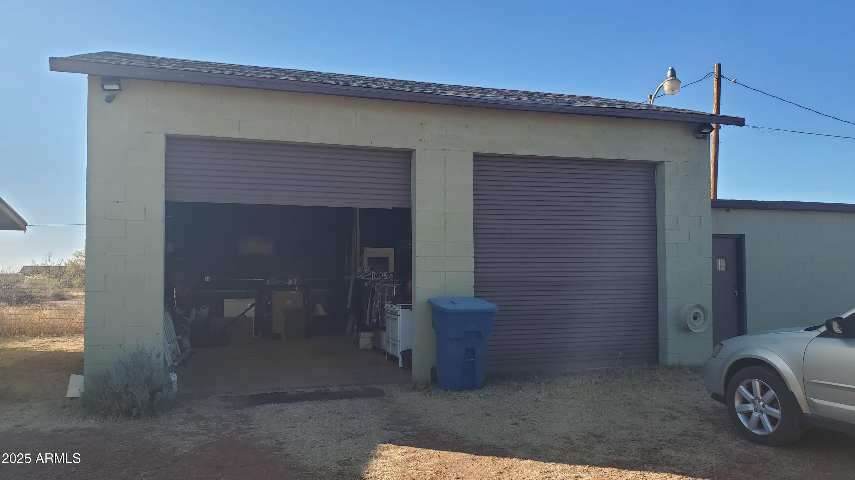 1005 West Purdy Lane Bisbee, AZ 85603 - Photo 18 of 23 a car parked in front of a house