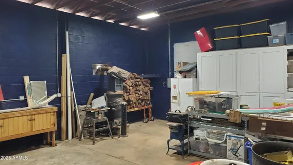 a room with furniture and gym equipment