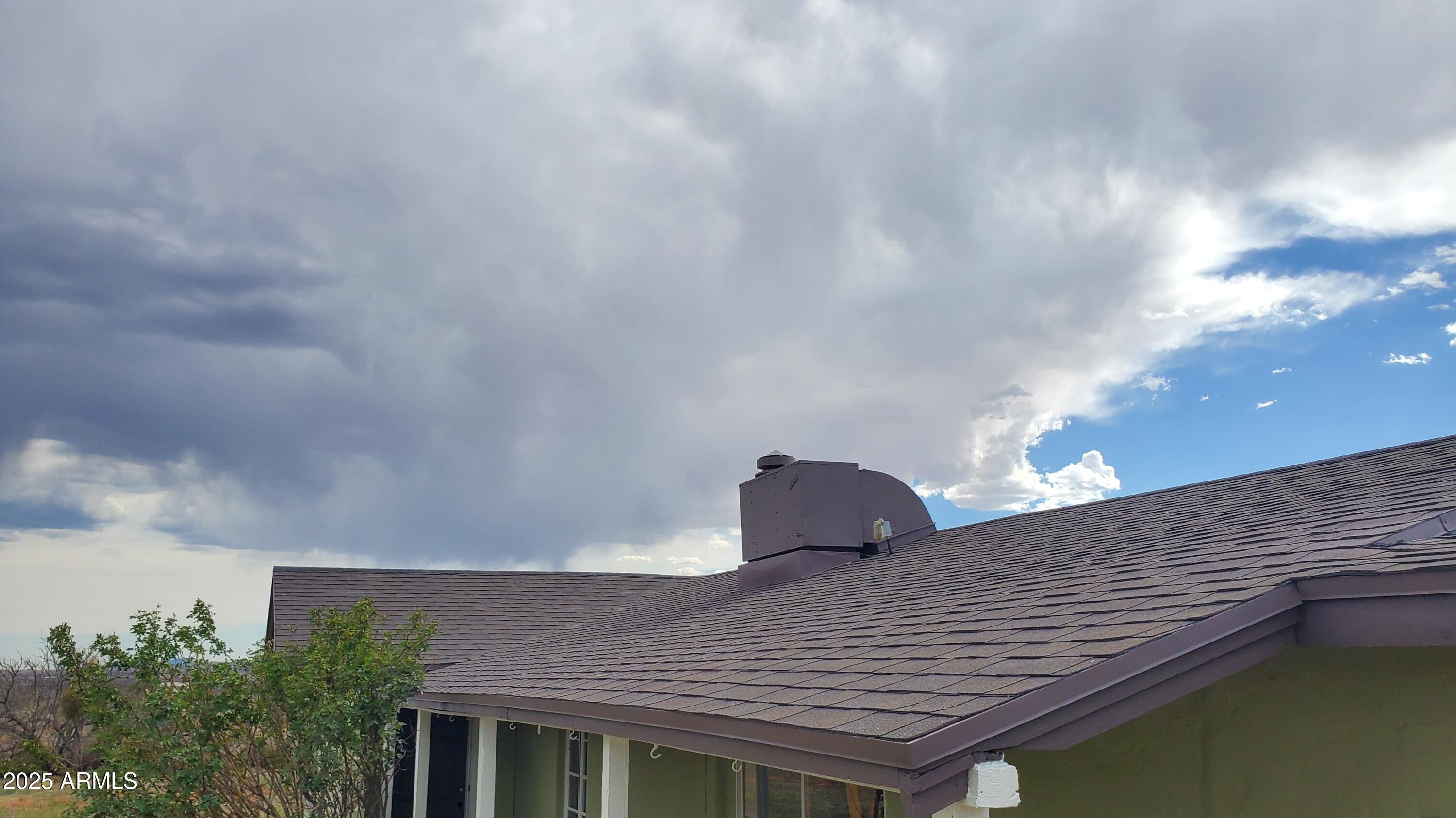 1005 West Purdy Lane Bisbee, AZ 85603 - Photo 6 of 23 a roof deck with table and chairs