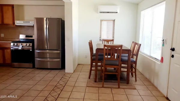 a view of a dining room with furniture