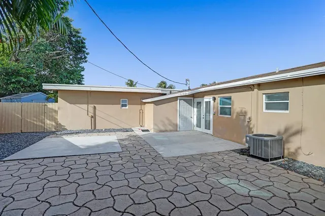 a house view with a backyard space