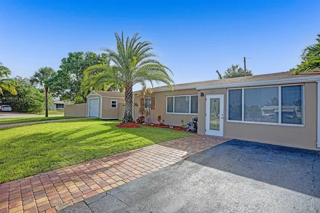 a house view with a garden space