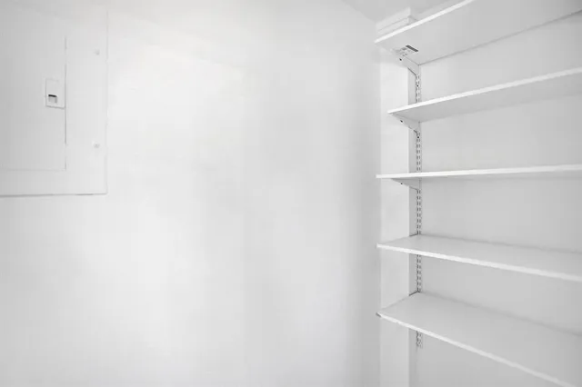 a view of an empty walk in closet