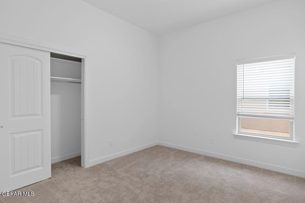 3757 Course Street El Paso, TX 79938 - Photo 6 of 14 an empty room with a window