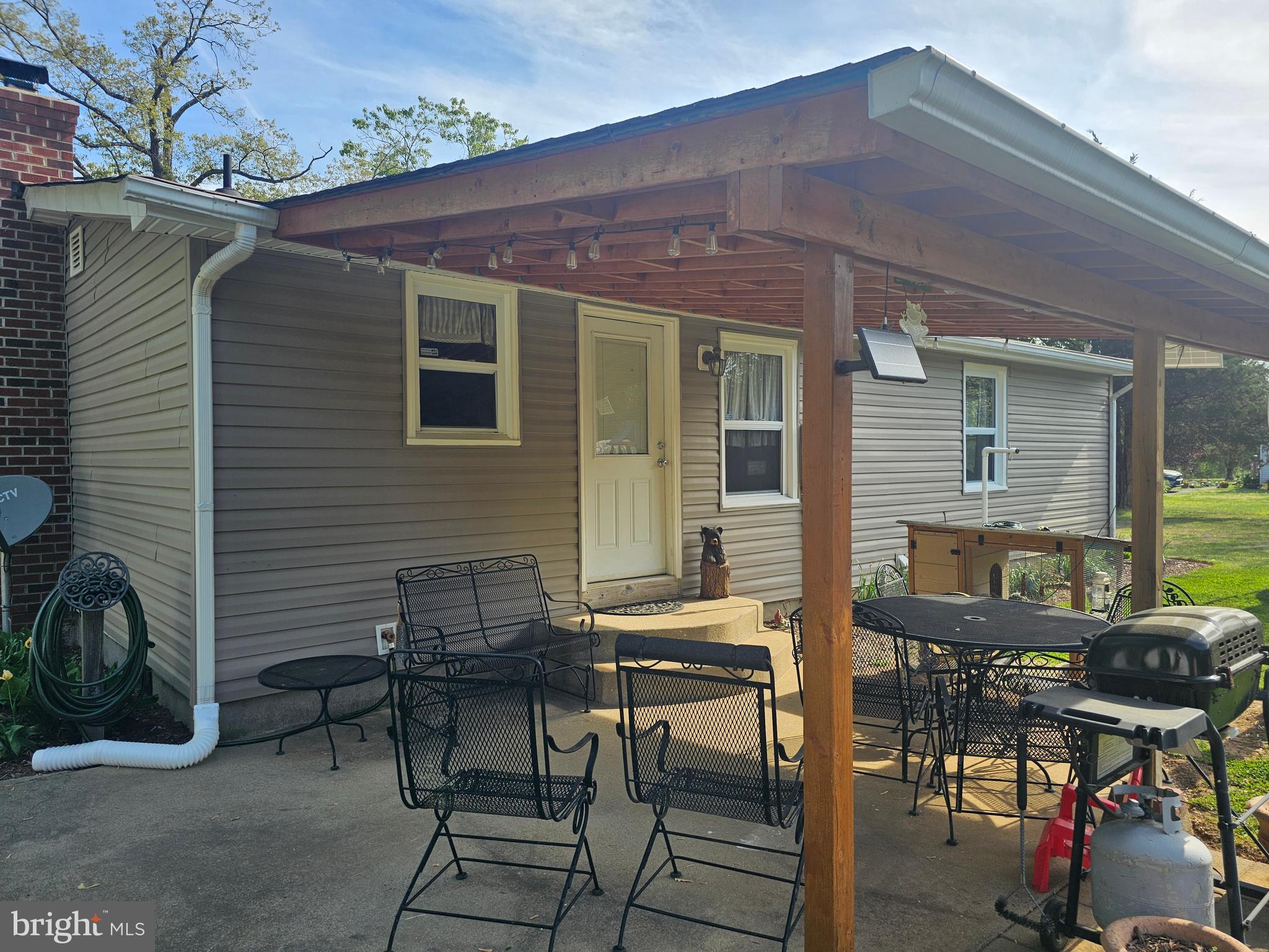 8421 Pamunkey Road Spotsylvania, VA 22551 - Photo 45 of 47 COVERED REAR PATIO