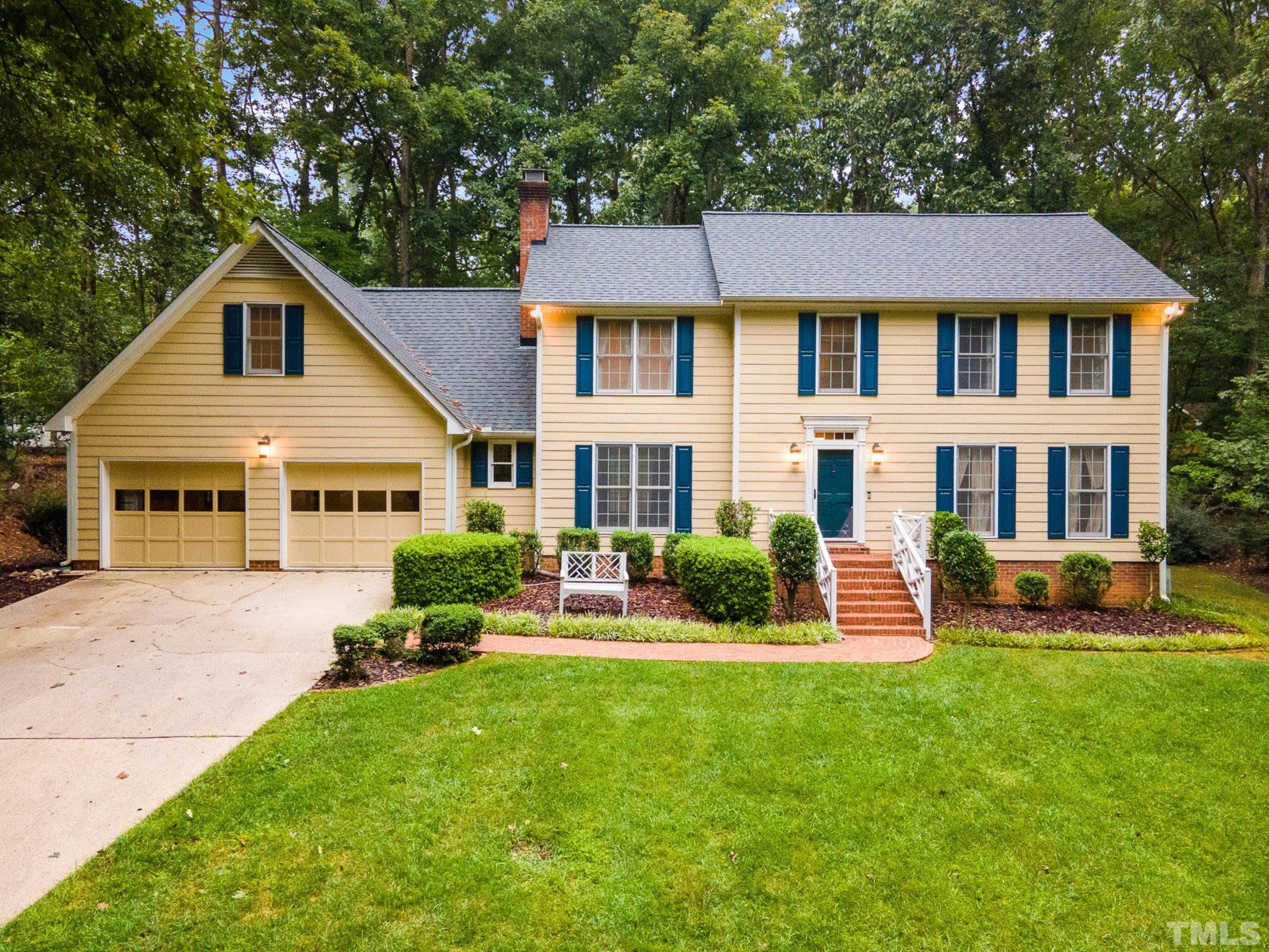 4909 Springwood Drive Raleigh, NC 27613 - Photo 1 of 59 a view of house with yard and front view of house