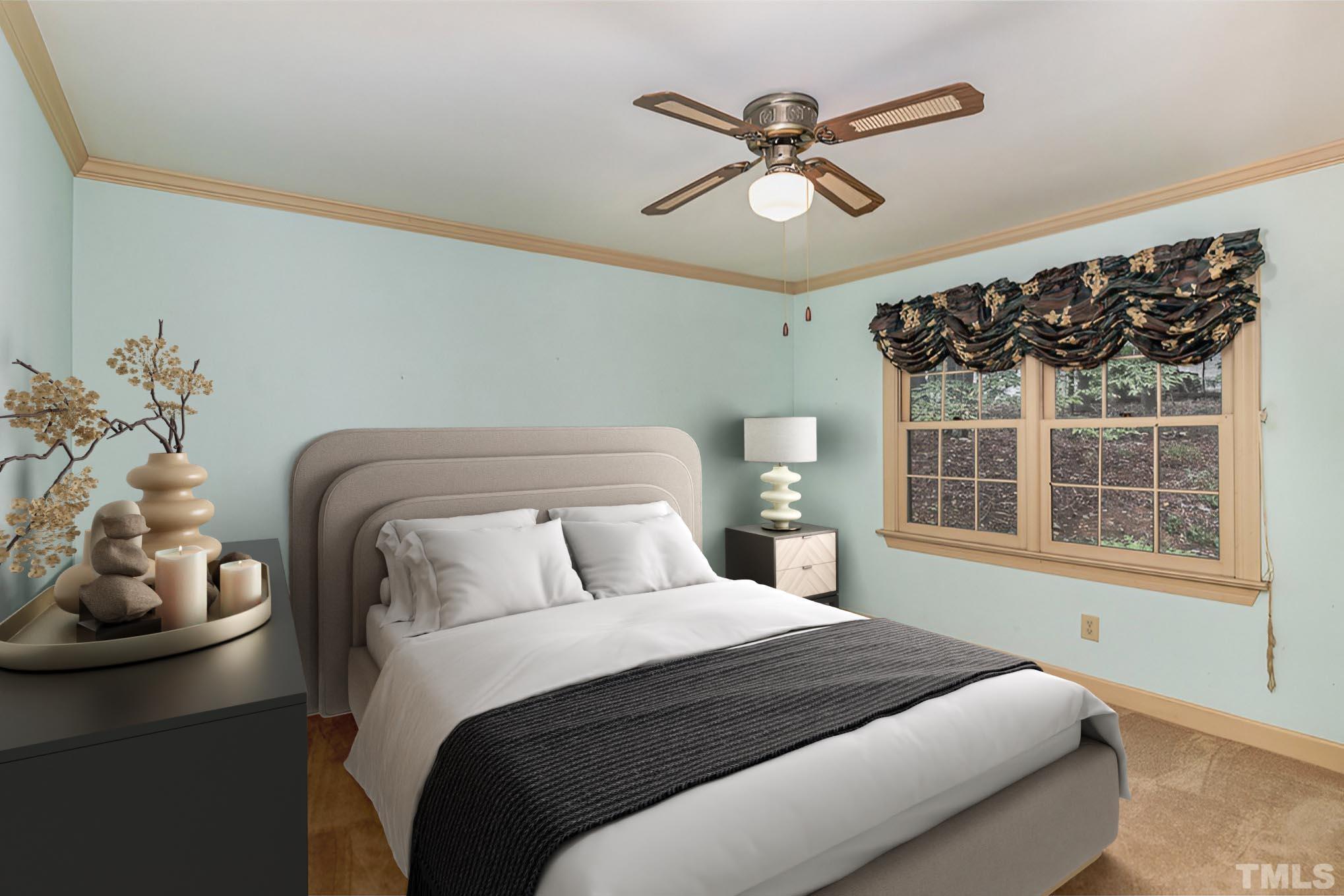 4909 Springwood Drive Raleigh, NC 27613 - Photo 26 of 59 a bedroom with a bed and a window