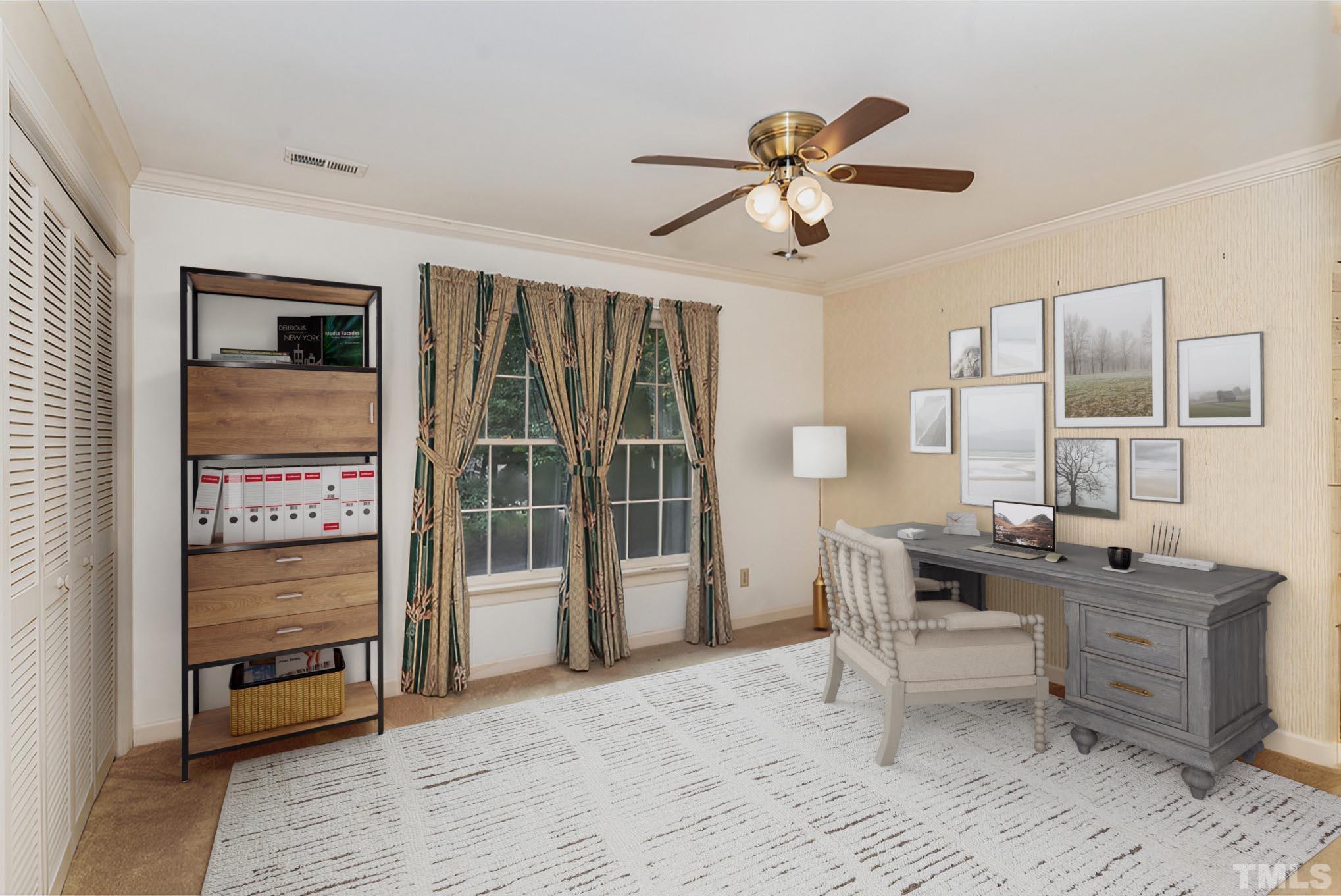 4909 Springwood Drive Raleigh, NC 27613 - Photo 36 of 59 a view of a workspace with furniture and a window