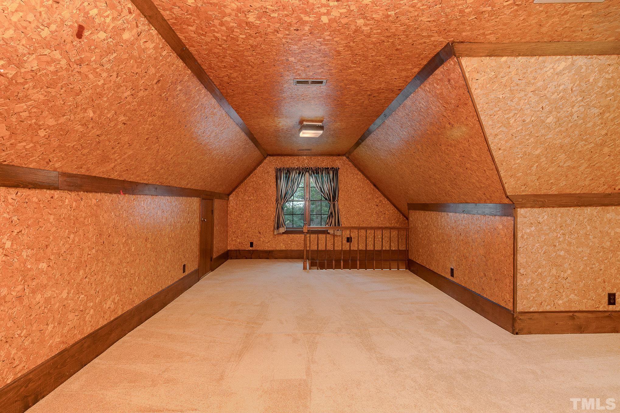 4909 Springwood Drive Raleigh, NC 27613 - Photo 44 of 59 a view of an empty room with a window