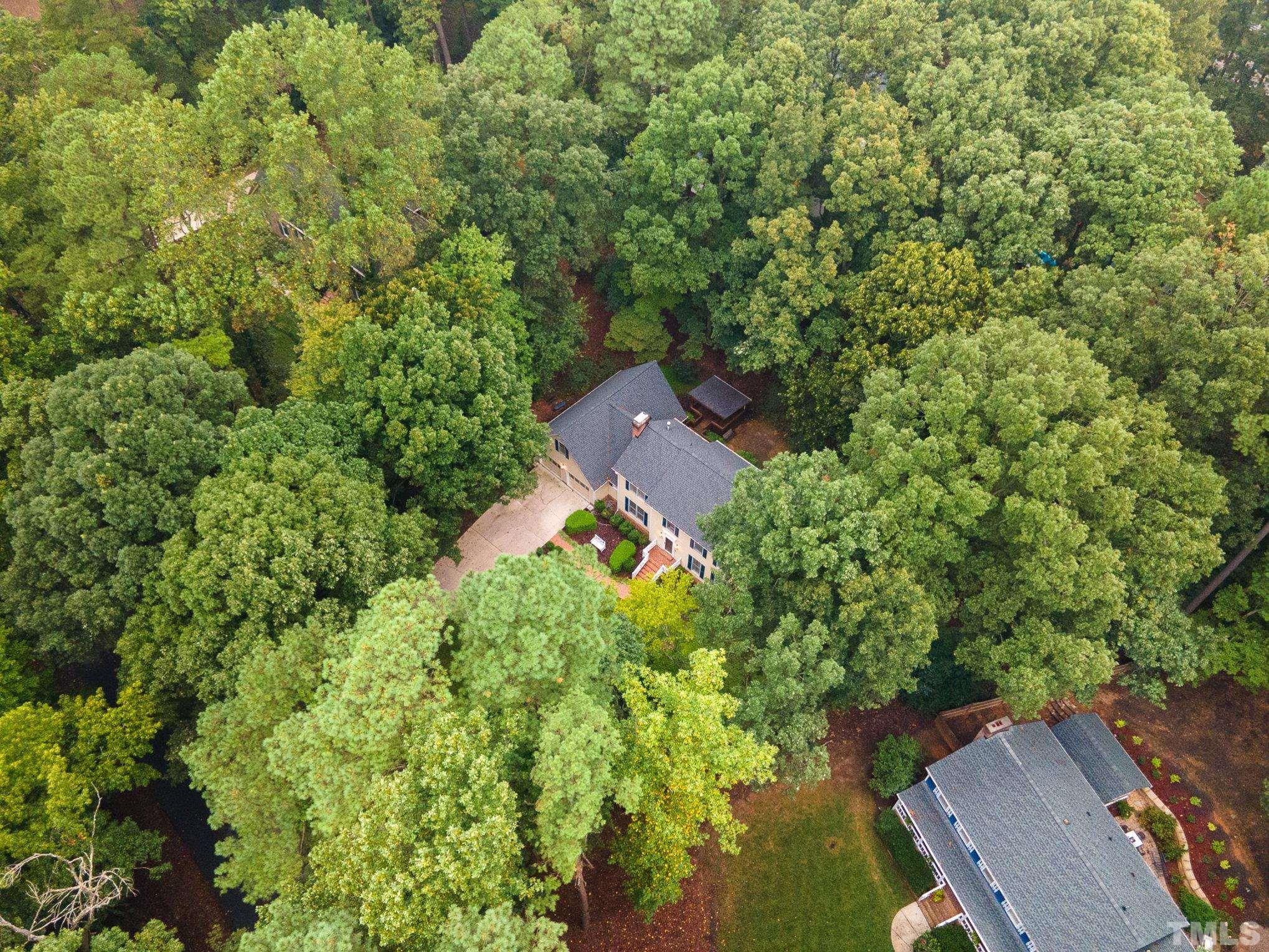 4909 Springwood Drive Raleigh, NC 27613 - Photo 57 of 59 an aerial view of a house with a yard