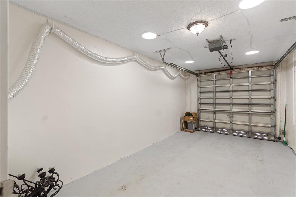 9580 Southwest 2nd Ct., Unit 9580 Pembroke Pines, FL 33025 - Photo 13 of 33 a view of a garage with furniture