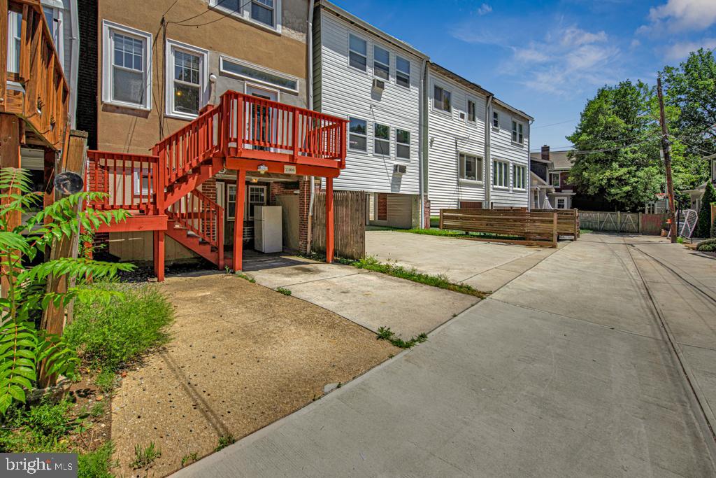 2406 37th Street Northwest Washington, DC 20007 - Photo 43 of 44 a view of a building with a yard