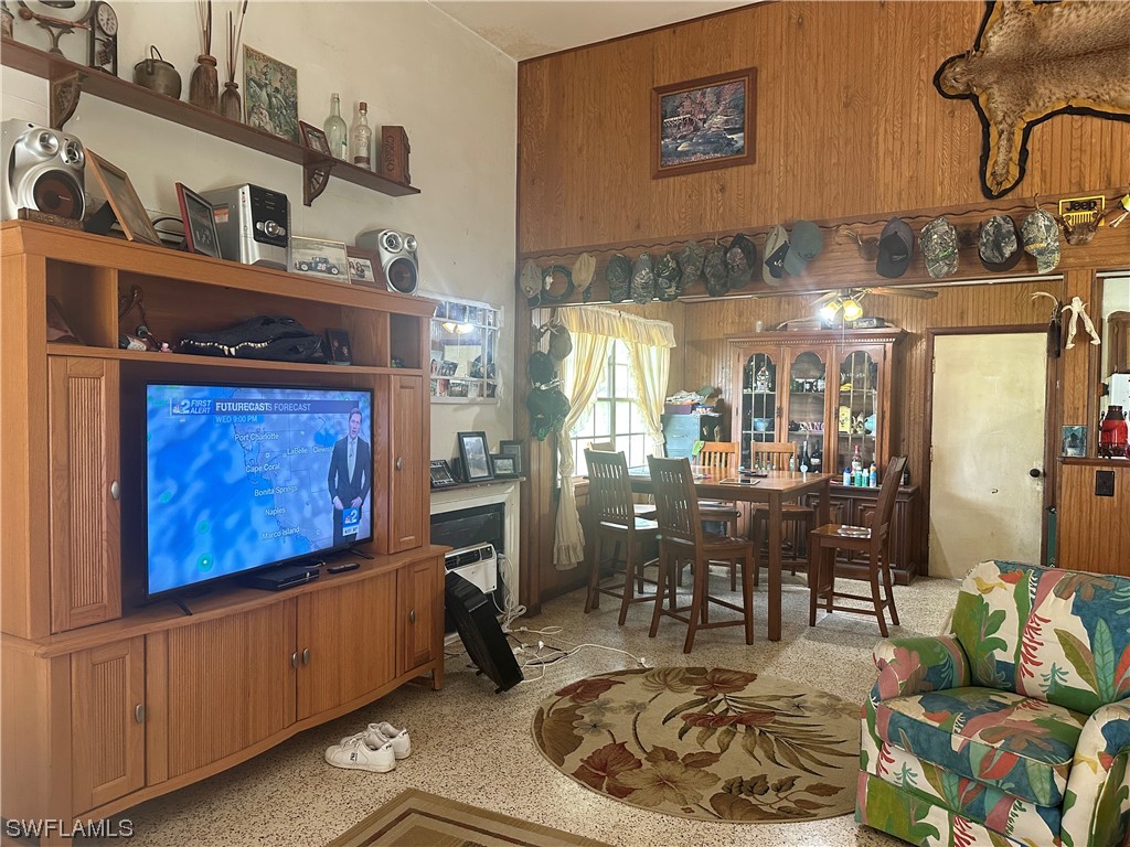 22841 North River Road Alva, FL 33920 - Photo 18 of 23 a dining room with furniture and chandelier