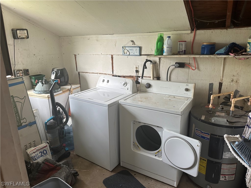 22841 North River Road Alva, FL 33920 - Photo 23 of 23 a utility room with dryer washer and other items