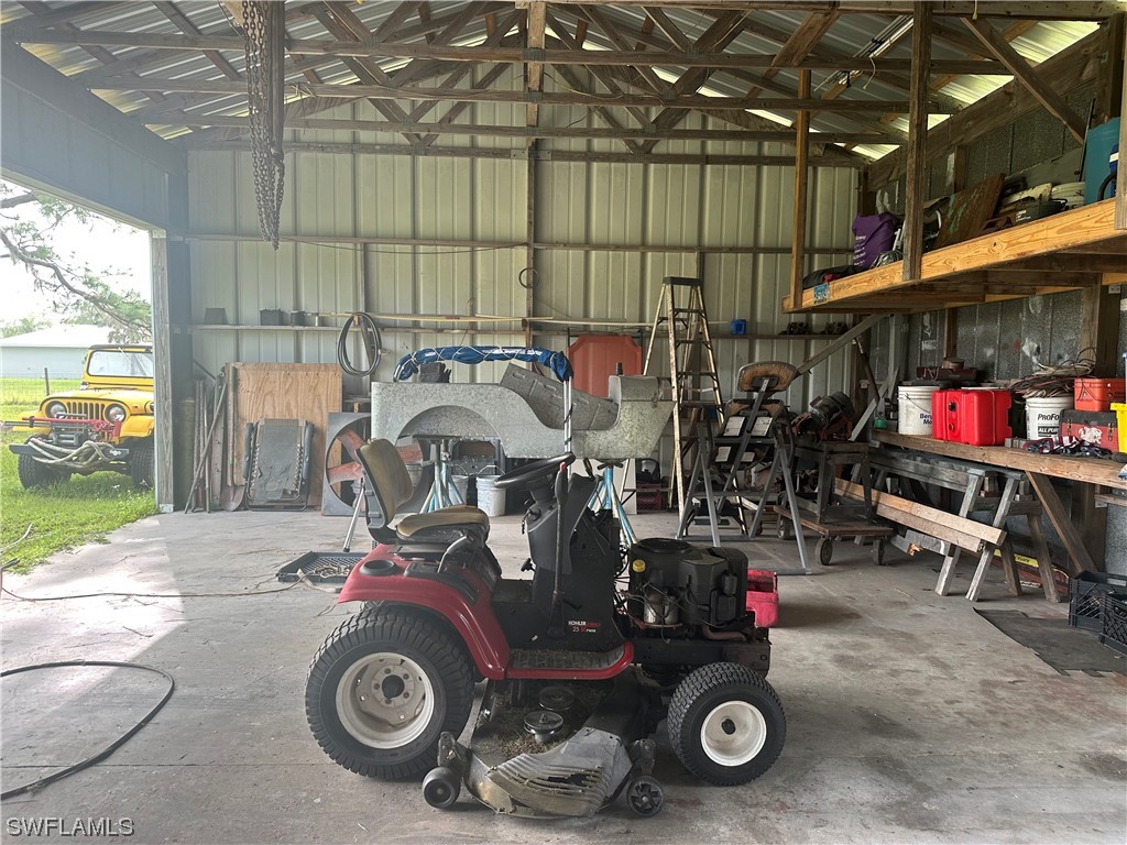 22841 North River Road Alva, FL 33920 - Photo 4 of 23 a view of storage and utility room