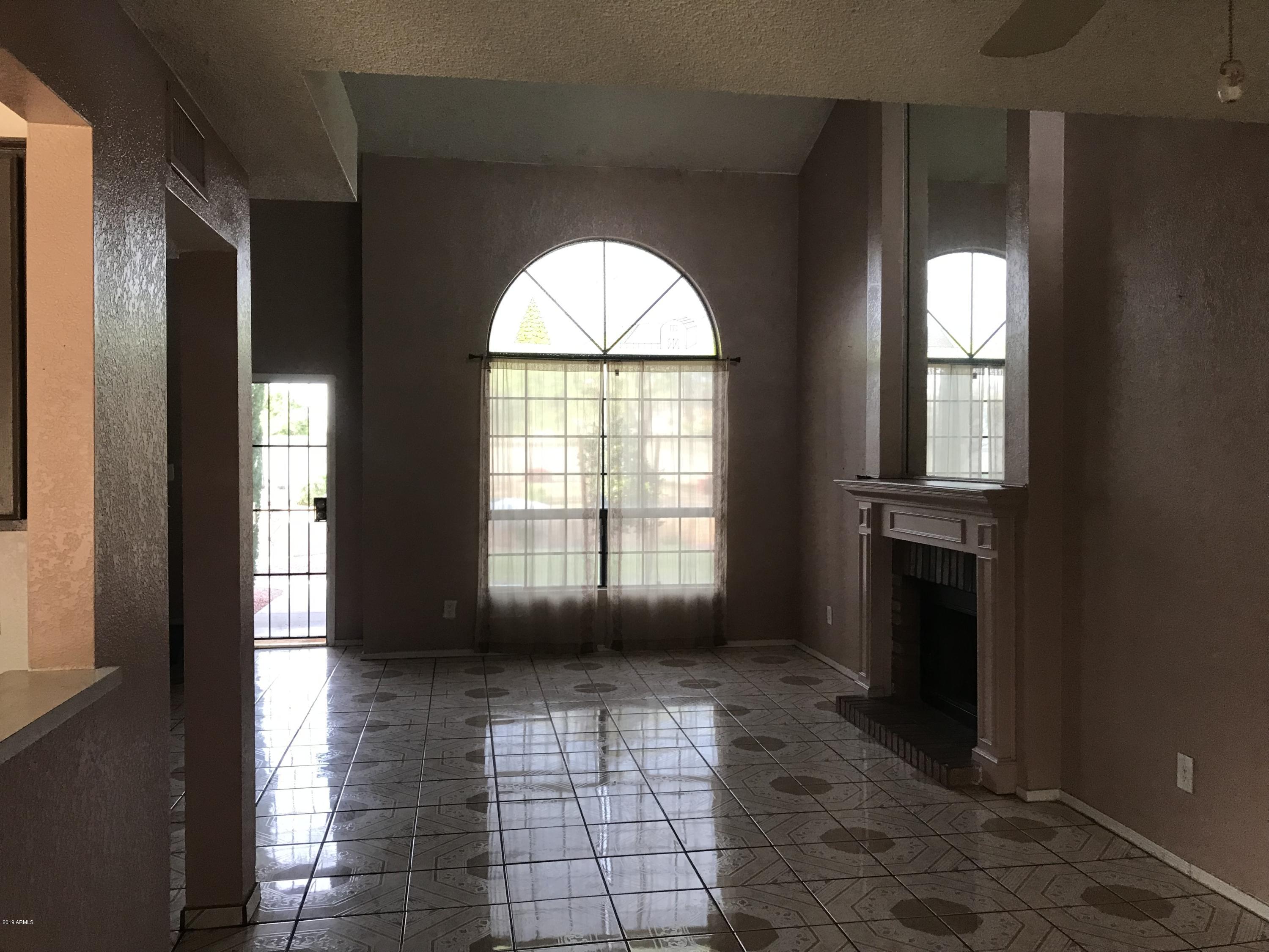 7437 West Ocotillo Road Glendale, AZ 85303 - Photo 6 of 20 7437 W Ocotillo Rd living room view