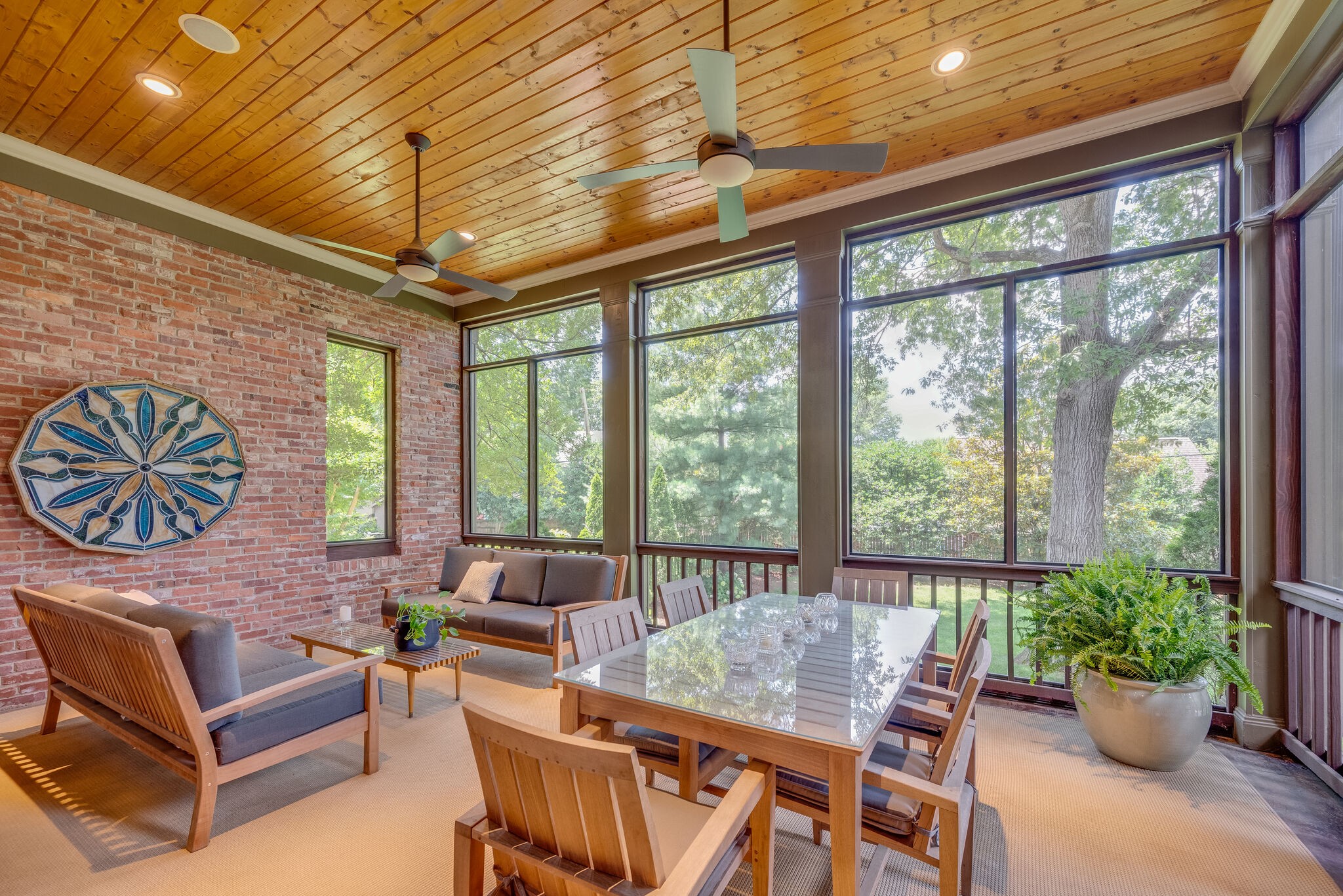 221 Mockingbird Road Nashville, TN 37205 - Photo 48 of 69 a dining room with furniture a chandelier and a potted plant