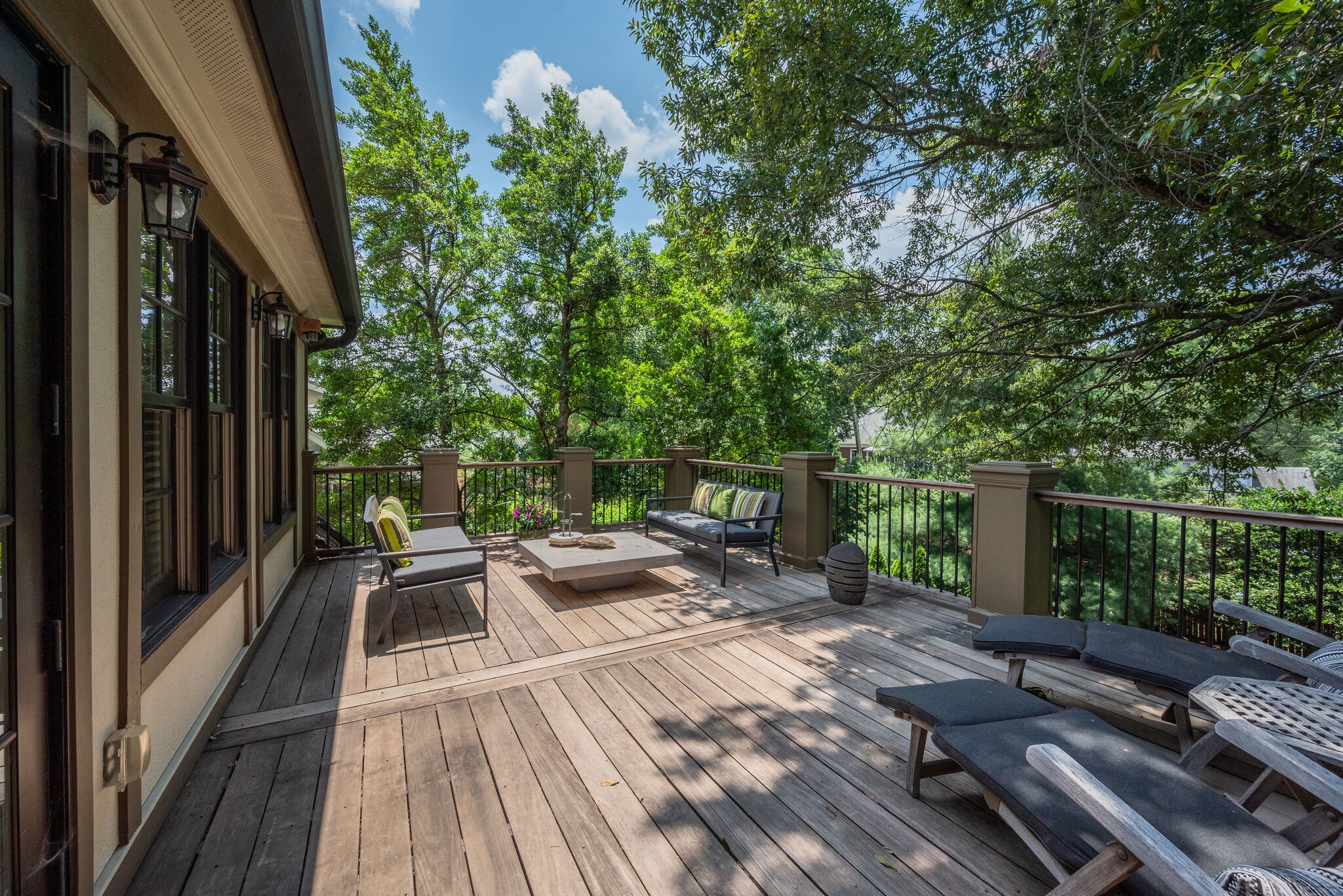 221 Mockingbird Road Nashville, TN 37205 - Photo 54 of 69 a view of balcony with wooden floor and outdoor seating