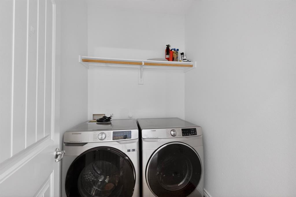 426 Harding Lane Lavon, TX 75166 - Photo 21 of 40 Dedicated laundry area featuring a wall-mounted shelving unit with a hanging rod