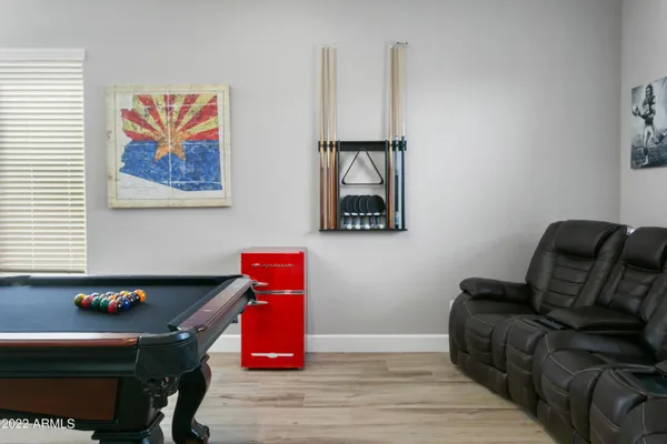 a room with furniture and wooden floor