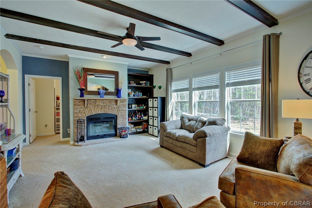 1496 Elsom Mascot Road Mattaponi, VA 23110 - Photo 13 of 33 a living room with furniture and a fireplace