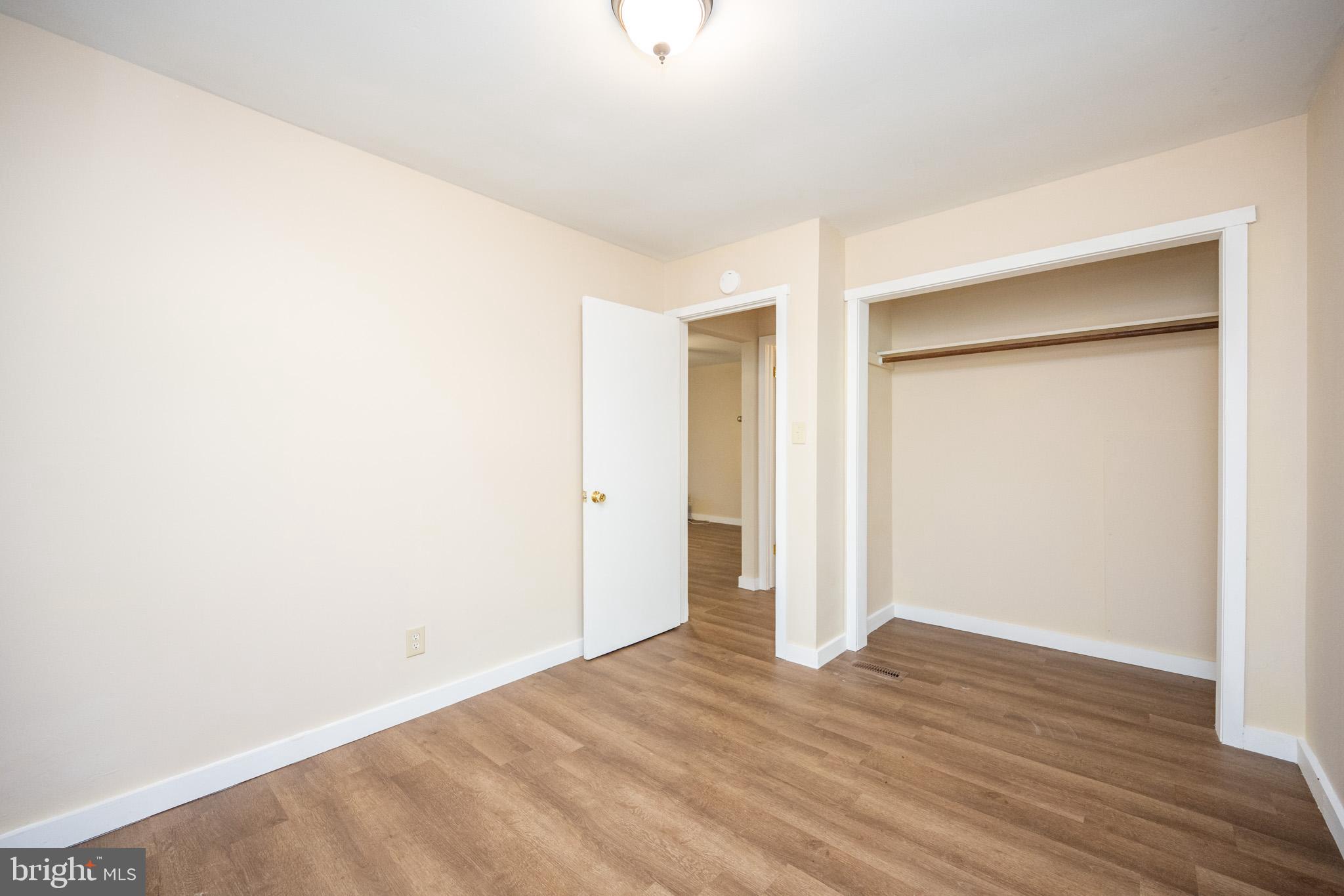 63 Wallman Road Oakland, MD 21550 - Photo 49 of 60 a view of an empty room with wooden floor