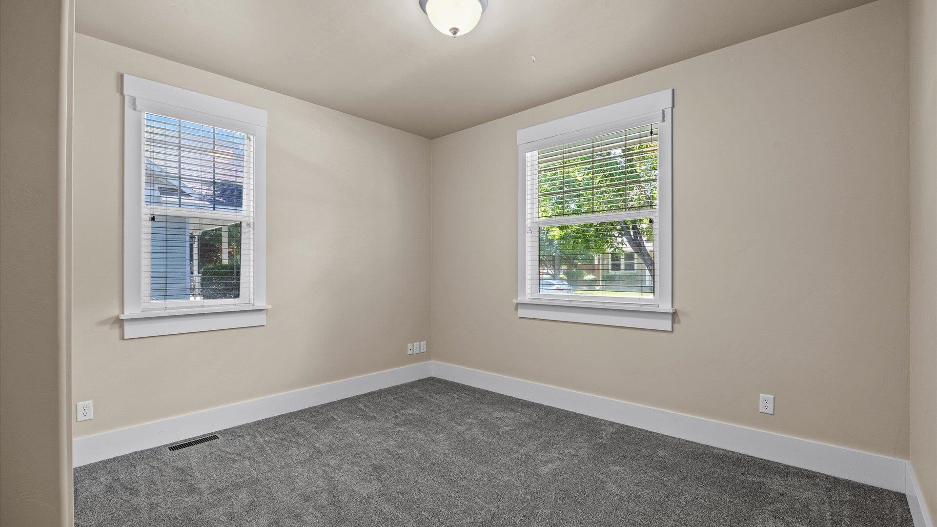 1115 Sunrose Lane Fruita, CO 81521 - Photo 16 of 32 an empty room with a window