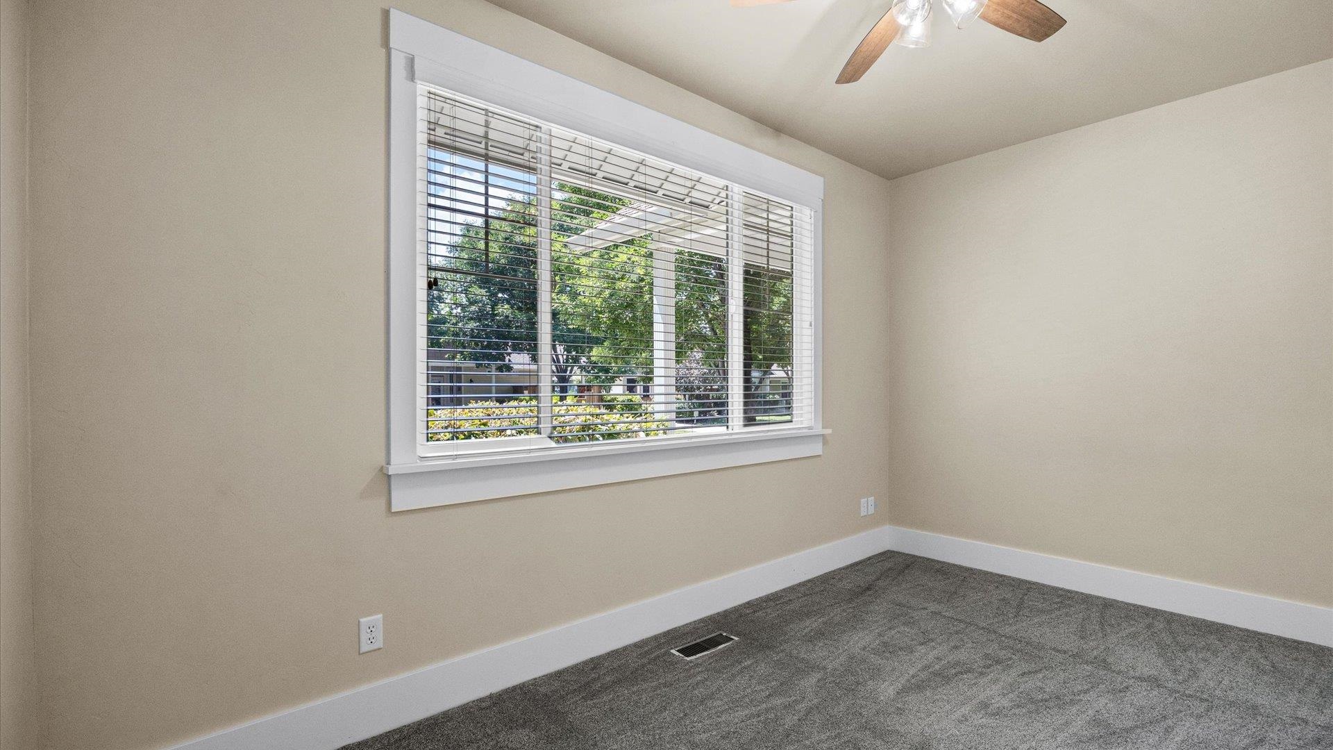 1115 Sunrose Lane Fruita, CO 81521 - Photo 18 of 32 an empty room with a window