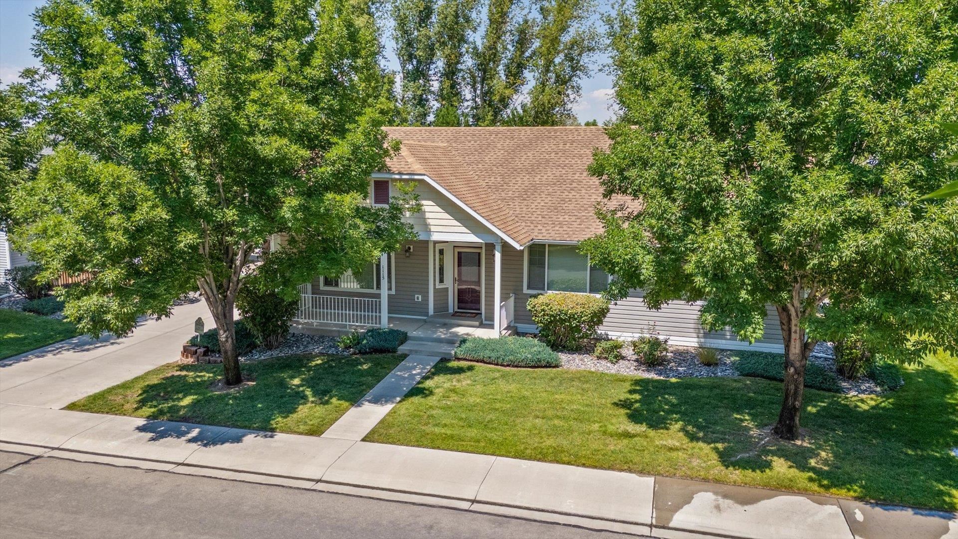 1115 Sunrose Lane Fruita, CO 81521 - Photo 24 of 32 a front view of a house with garden