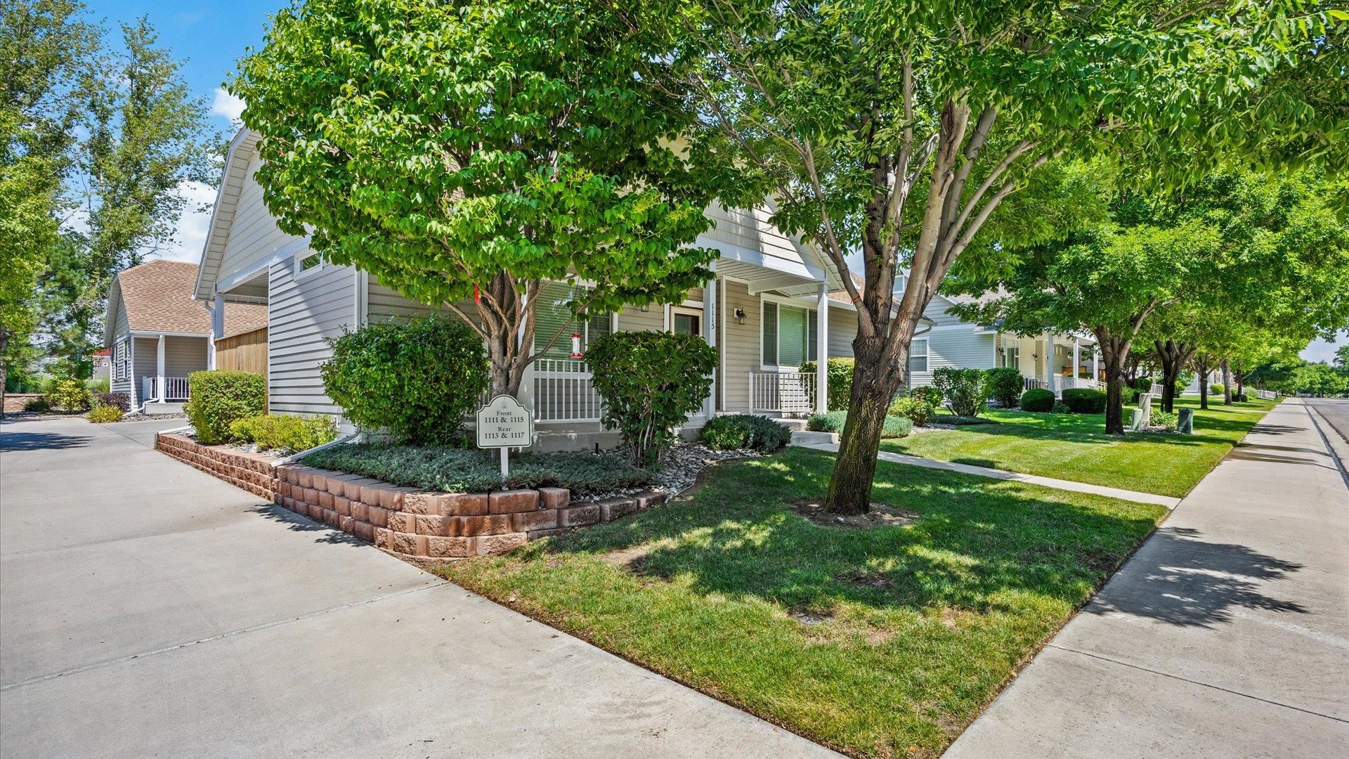 1115 Sunrose Lane Fruita, CO 81521 - Photo 25 of 32 a front view of a house with a yard