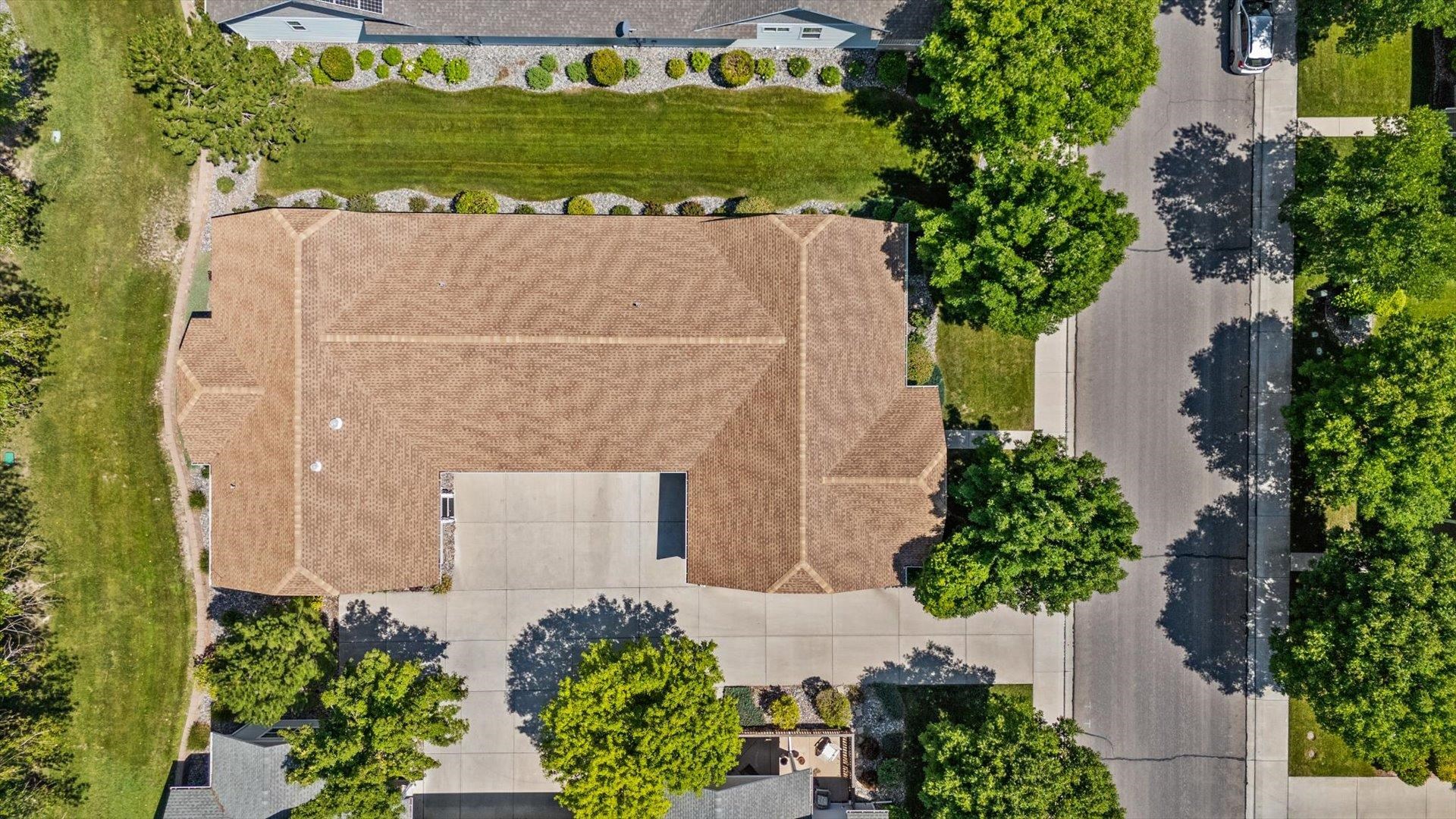 1115 Sunrose Lane Fruita, CO 81521 - Photo 27 of 32 an aerial view of a house with a yard