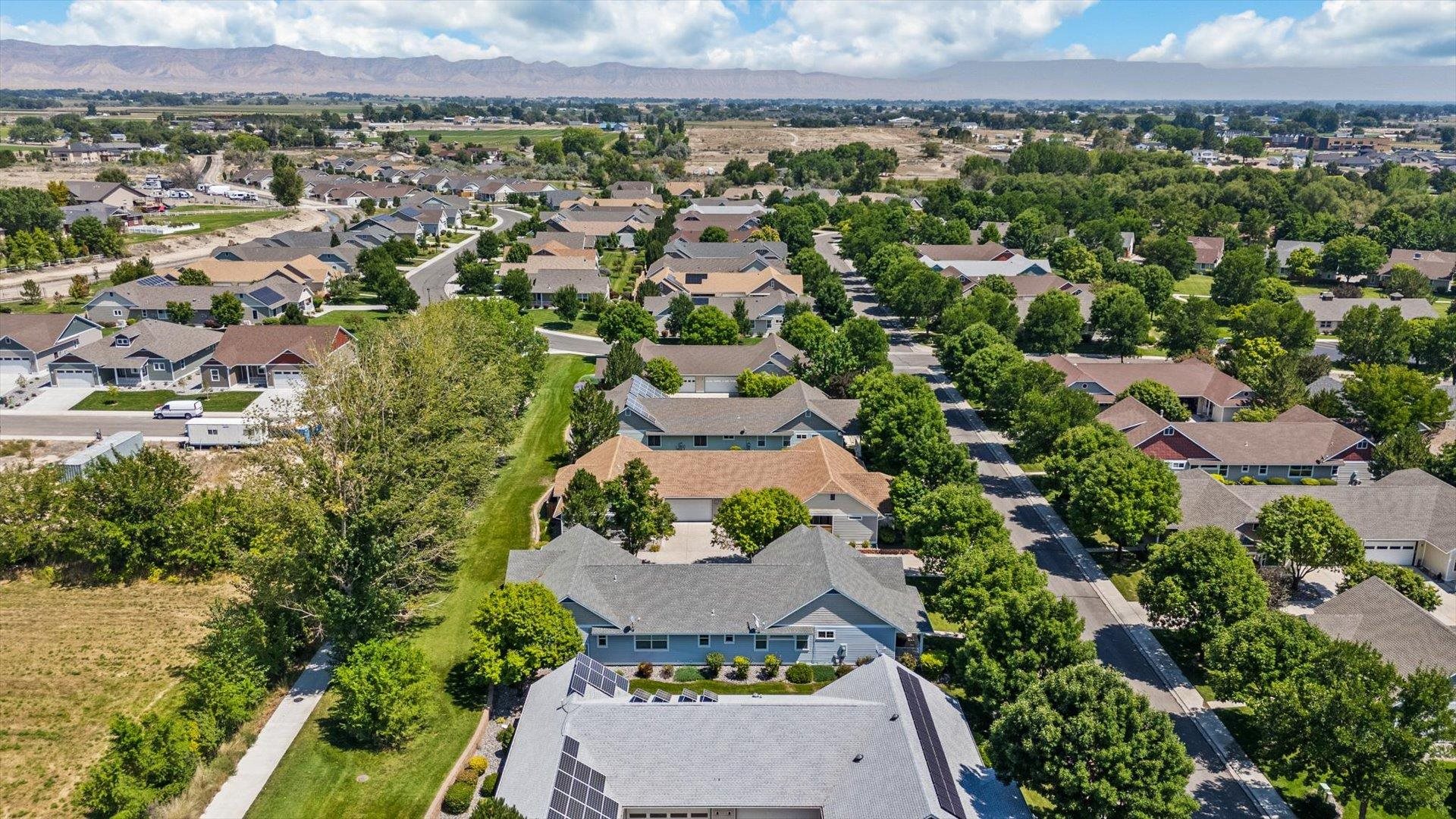 1115 Sunrose Lane Fruita, CO 81521 - Photo 29 of 32 an aerial view of a house with a garden