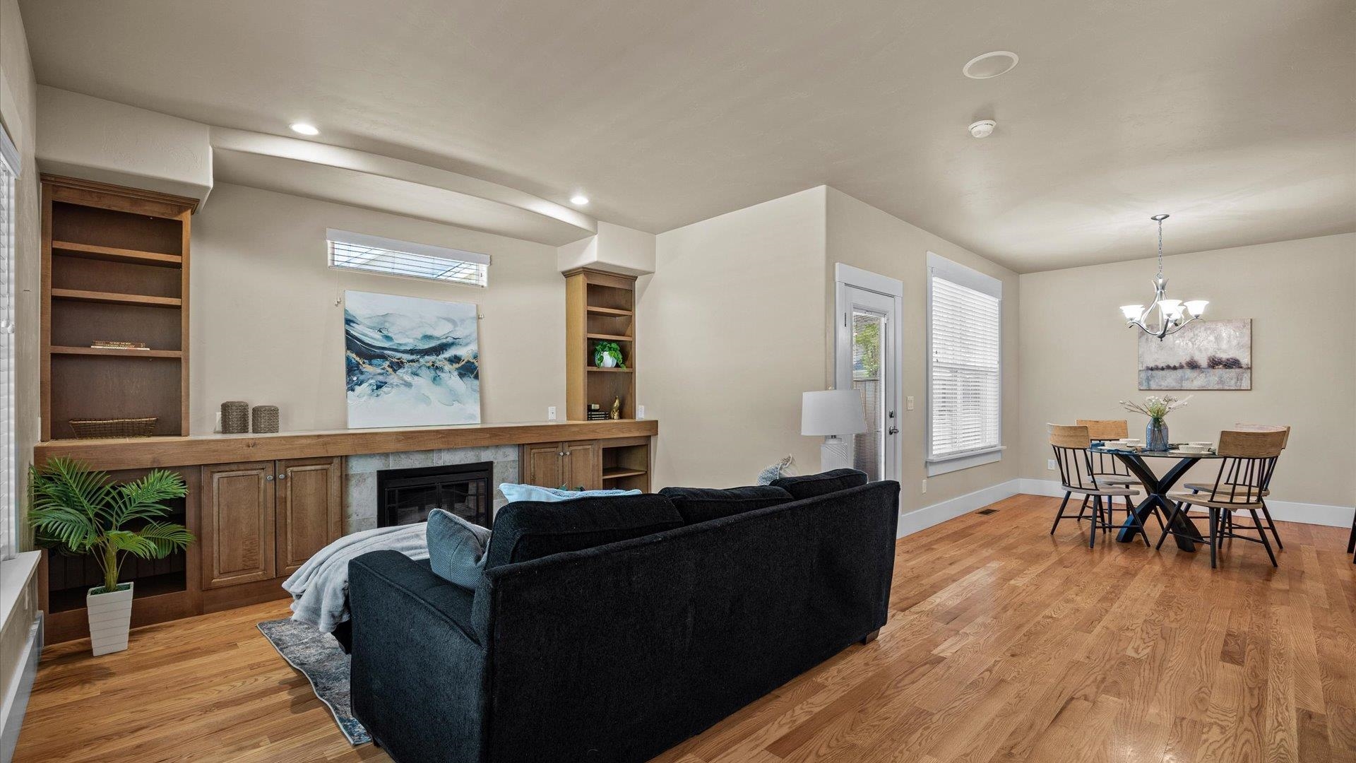 1115 Sunrose Lane Fruita, CO 81521 - Photo 5 of 32 a living room with furniture and wooden floor