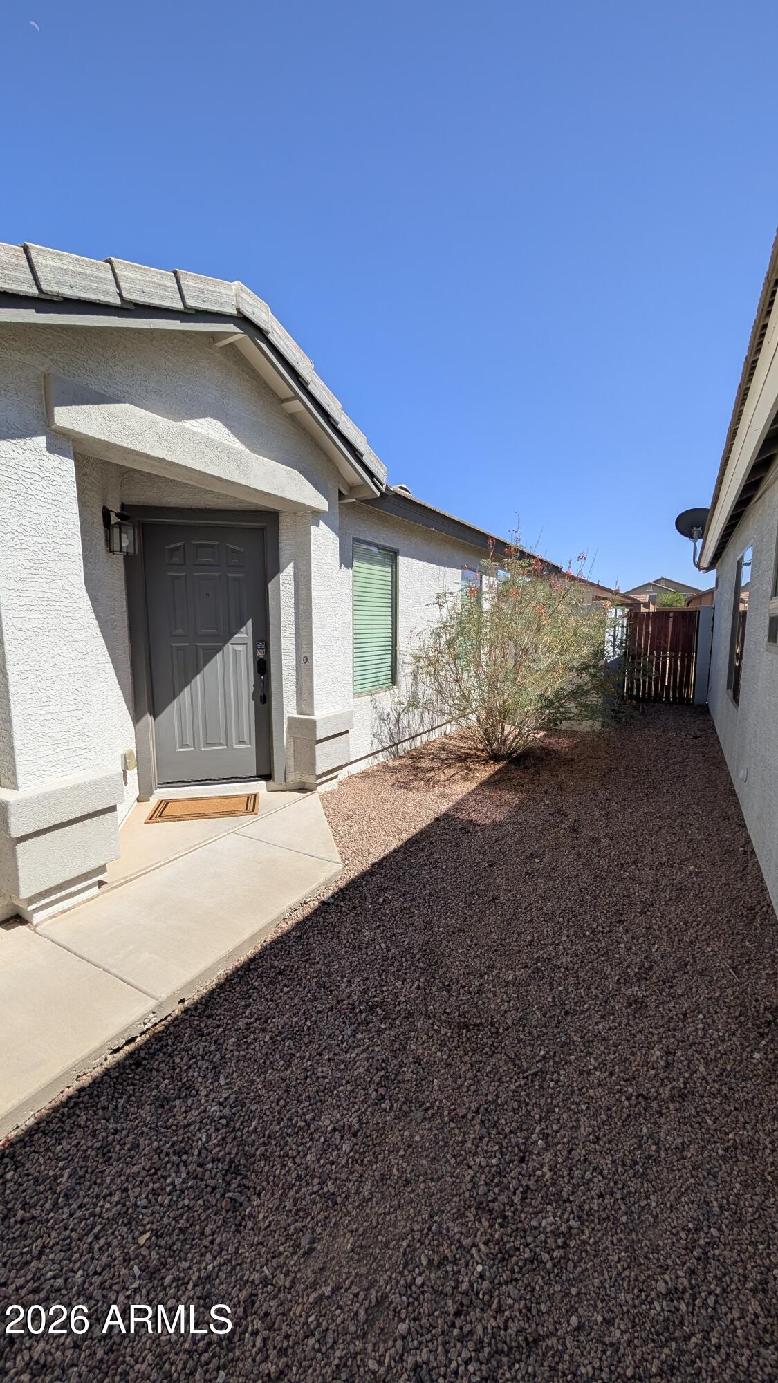 1377 East Pryor Road San Tan Valley, AZ 85140 - Photo 3 of 31 a view of a house with a yard