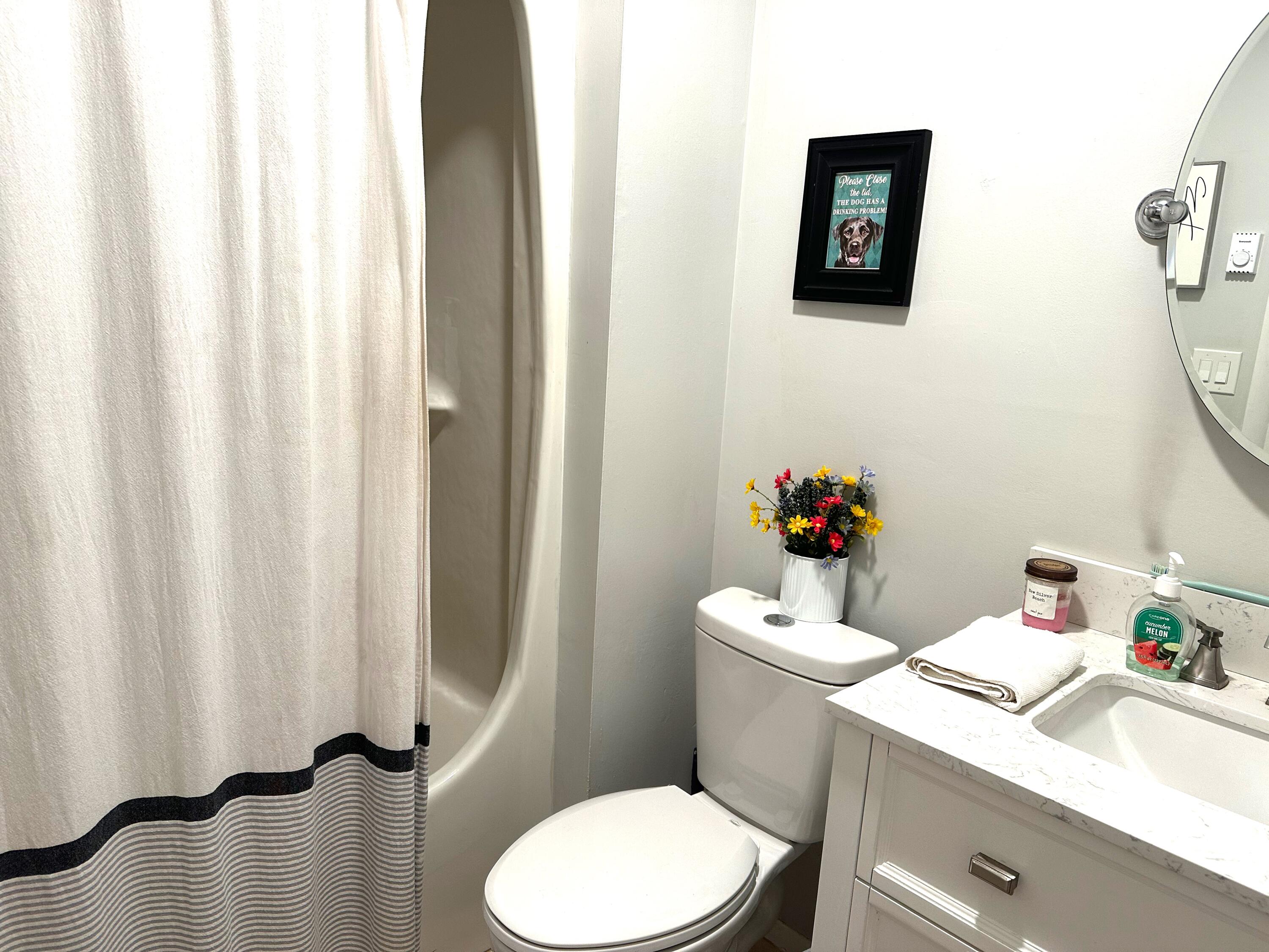 21 Round House Road Bourne, MA 02532 - Photo 15 of 21 a bathroom with a sink mirror and toilet