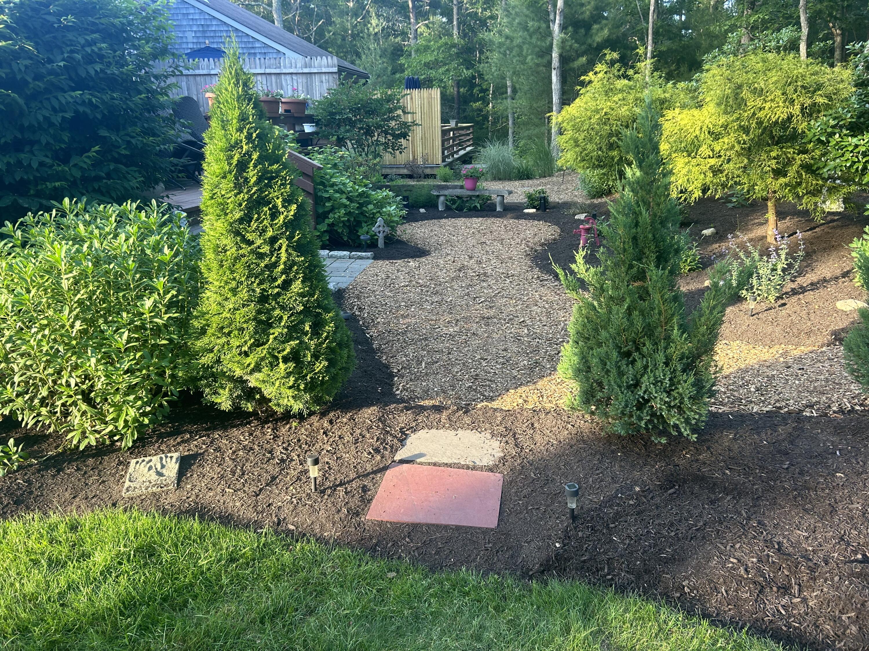 21 Round House Road Bourne, MA 02532 - Photo 19 of 21 a backyard of a house with lots of green space