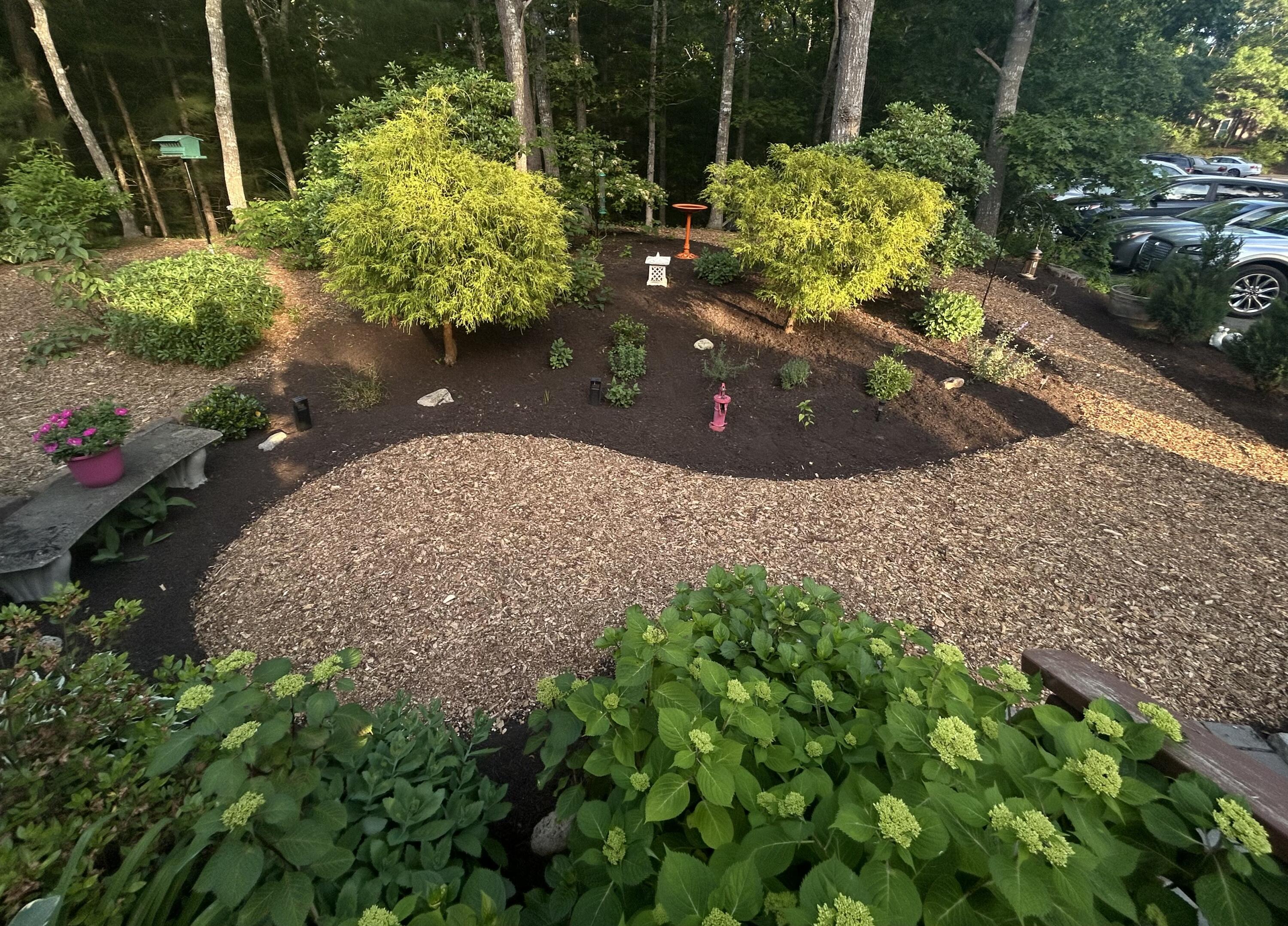 21 Round House Road Bourne, MA 02532 - Photo 20 of 21 a view of a garden with plants