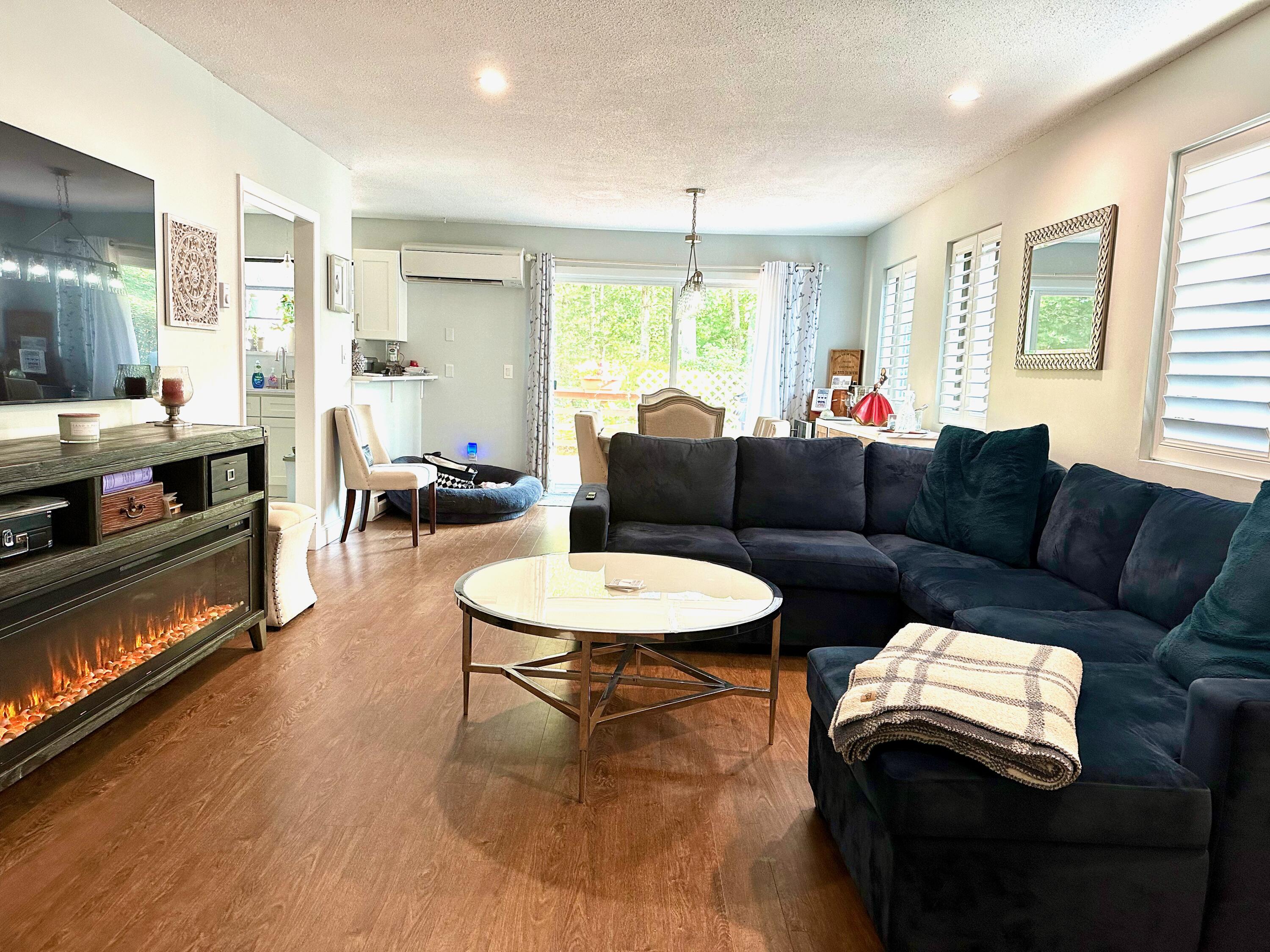 21 Round House Road Bourne, MA 02532 - Photo 3 of 21 a living room with furniture and a large window