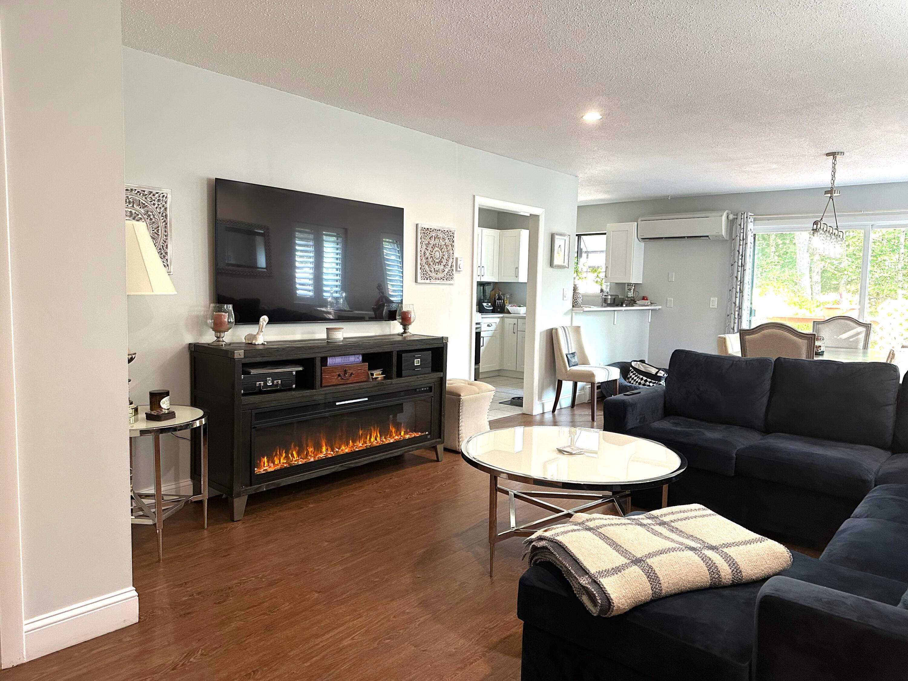 21 Round House Road Bourne, MA 02532 - Photo 4 of 21 a living room with furniture and a flat screen tv