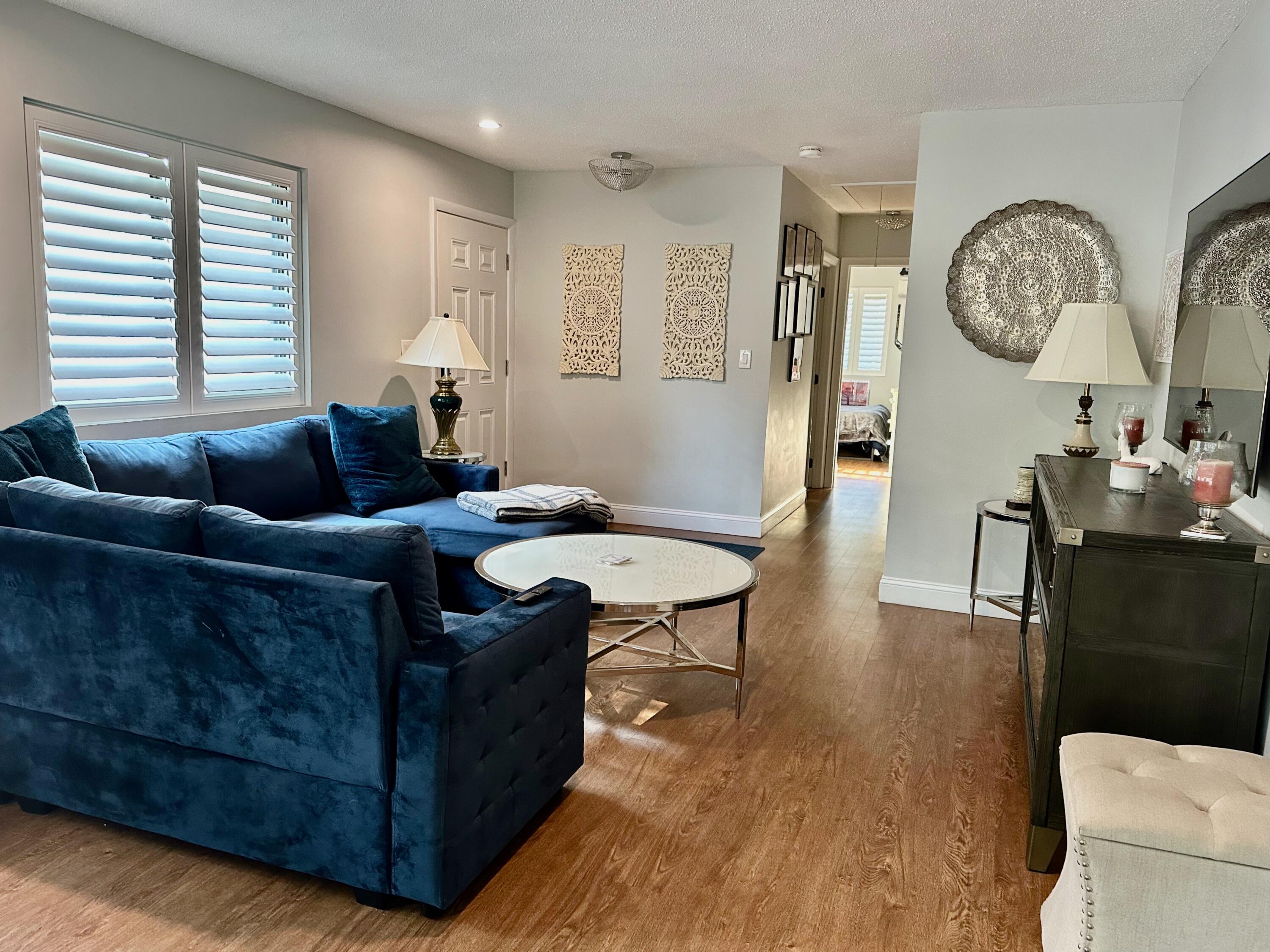 21 Round House Road Bourne, MA 02532 - Photo 5 of 21 a living room with furniture and a wooden floor